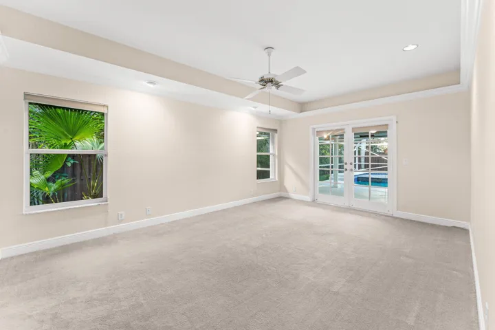 Primary Bedroom with walkout to patio/pool area