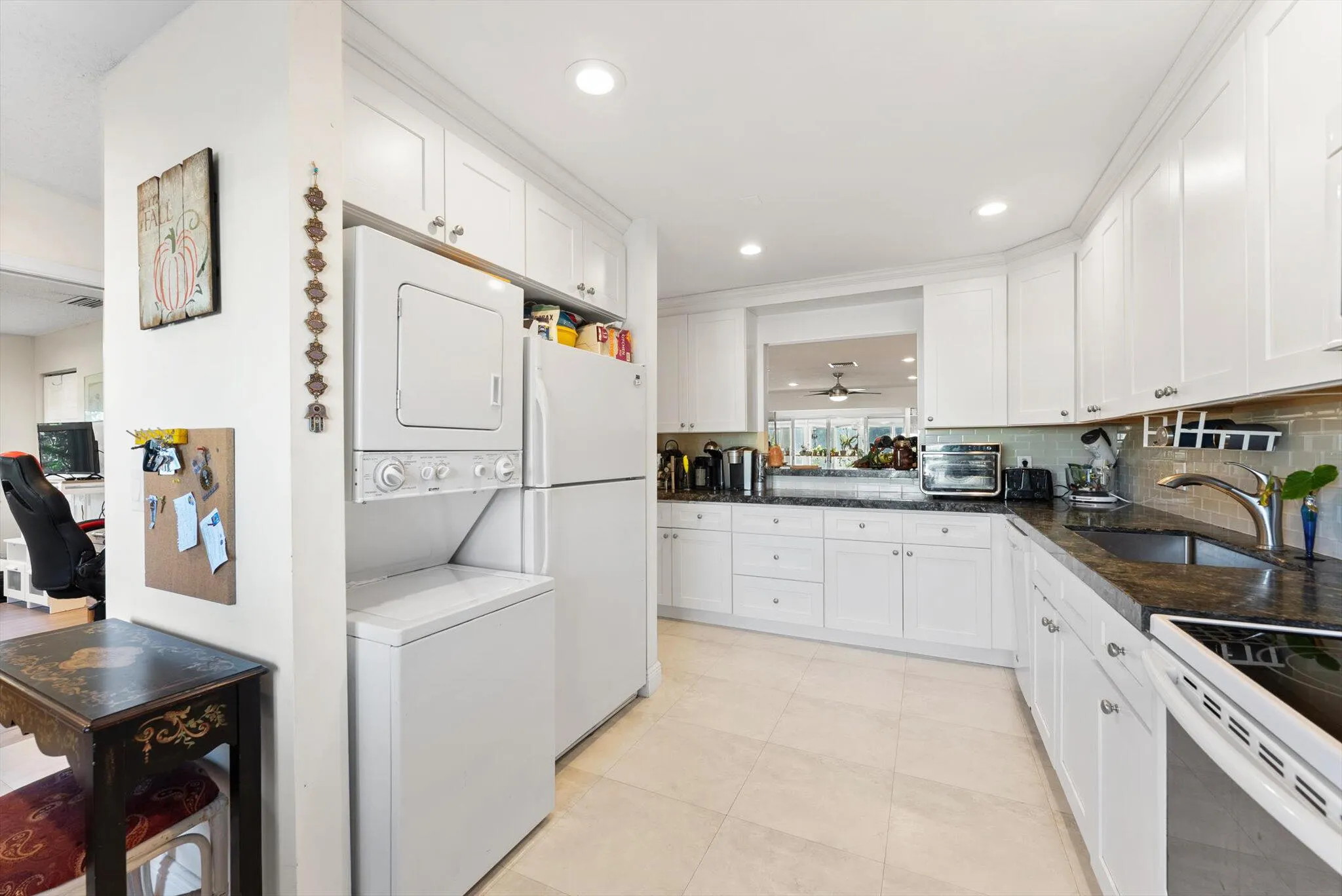 Open Kitchen with laundry and space for a small desk or entry table
