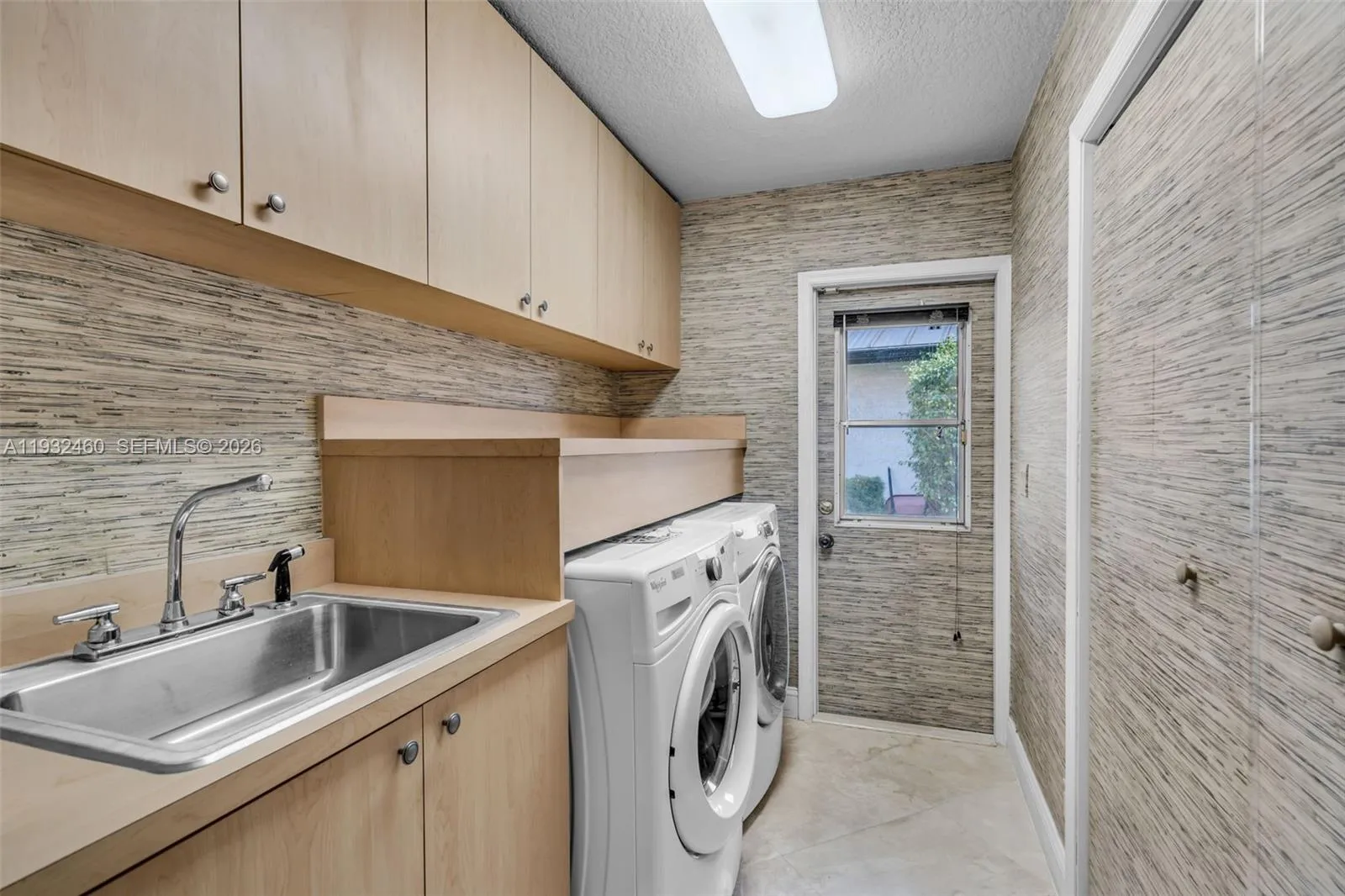 Laundry Room with closet