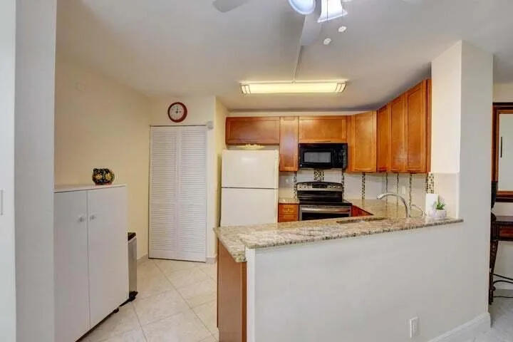 GRANITE COUNTERTOPS, W/D IN CLOSET NEXT TO FRIDGE