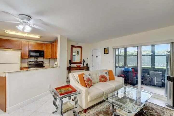 KITCHEN, LR, ENCLOSED PATIO