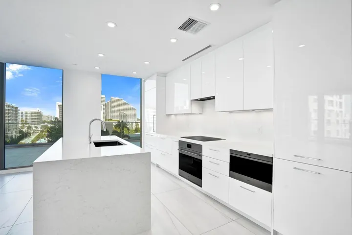Light and bright gourmet kitchen features high end appliances and gorgeous views.
