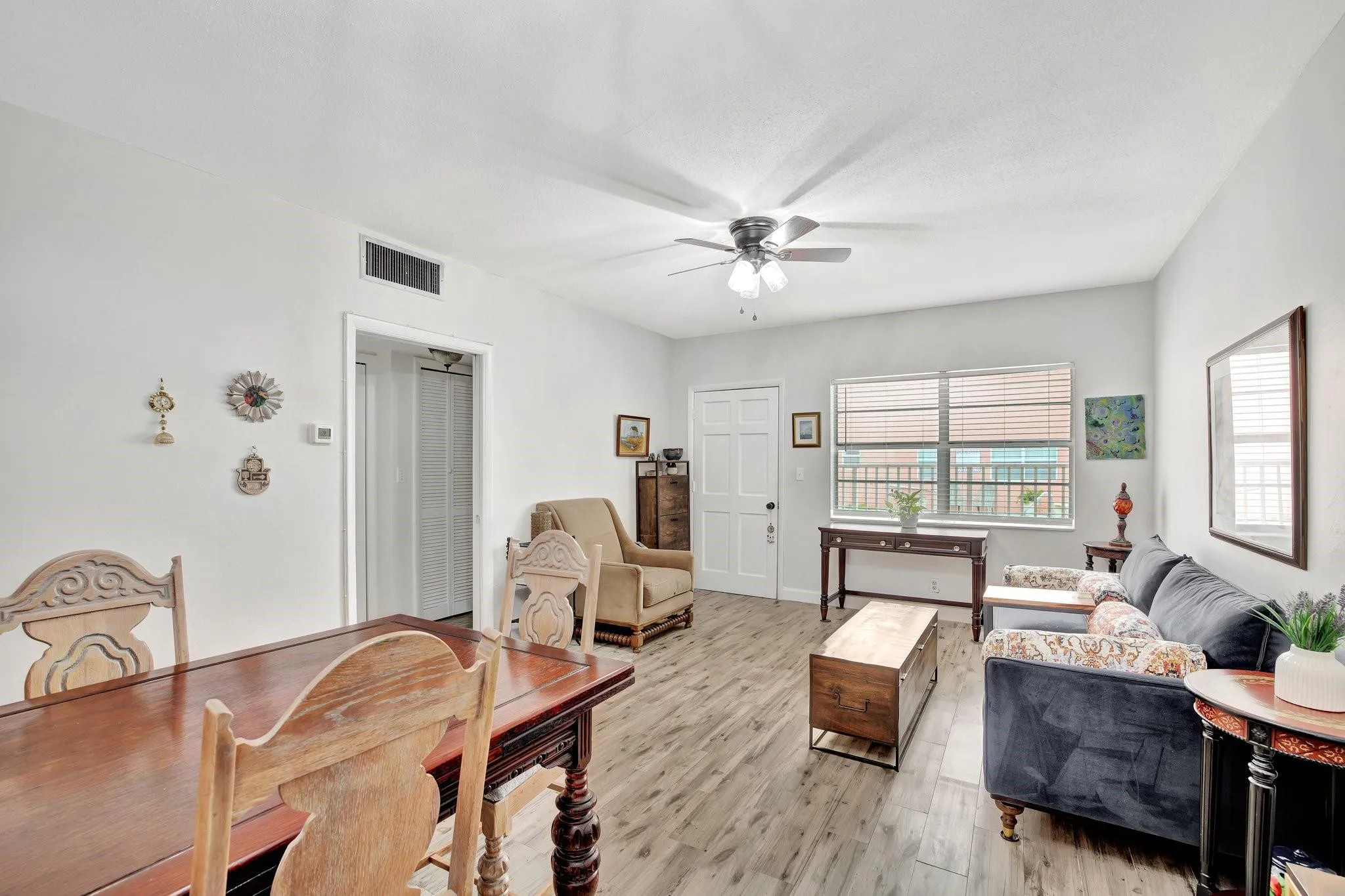 Updates include sleek porcelain tile floors, freshly painted walls and baseboards throughout the condo