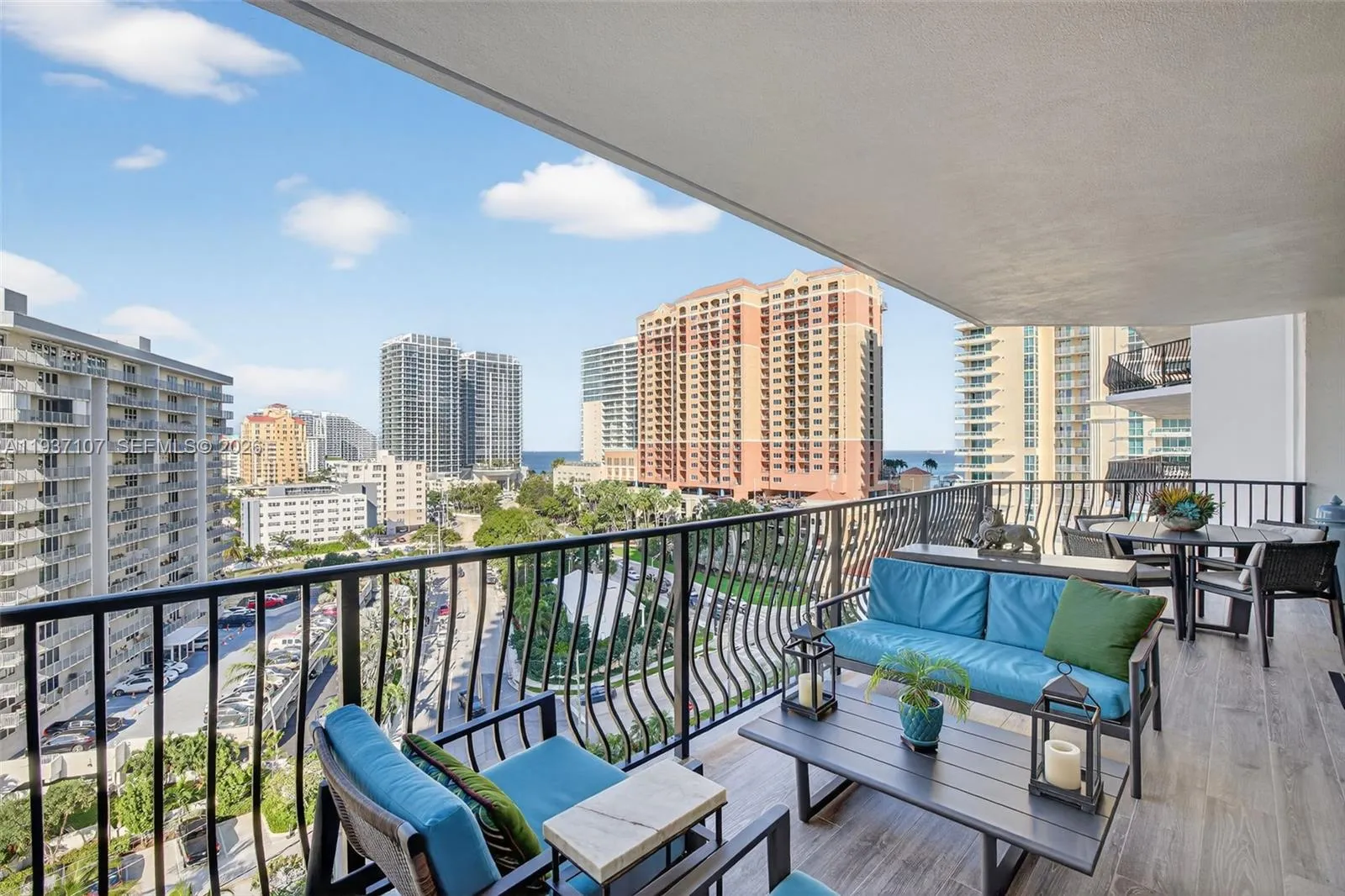 Actual balcony. New plank wood look tile flooring. Expansive balcony w/ room for dining, lounge seating and electric grill. With gorgeous water views.