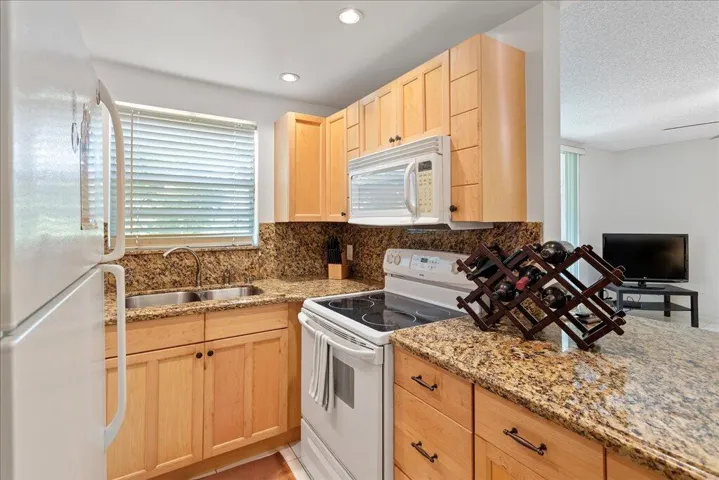 Kitchen opens into living room