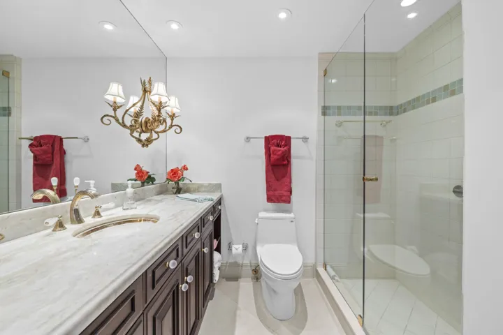 Full bathroom as part of second bedroom suite