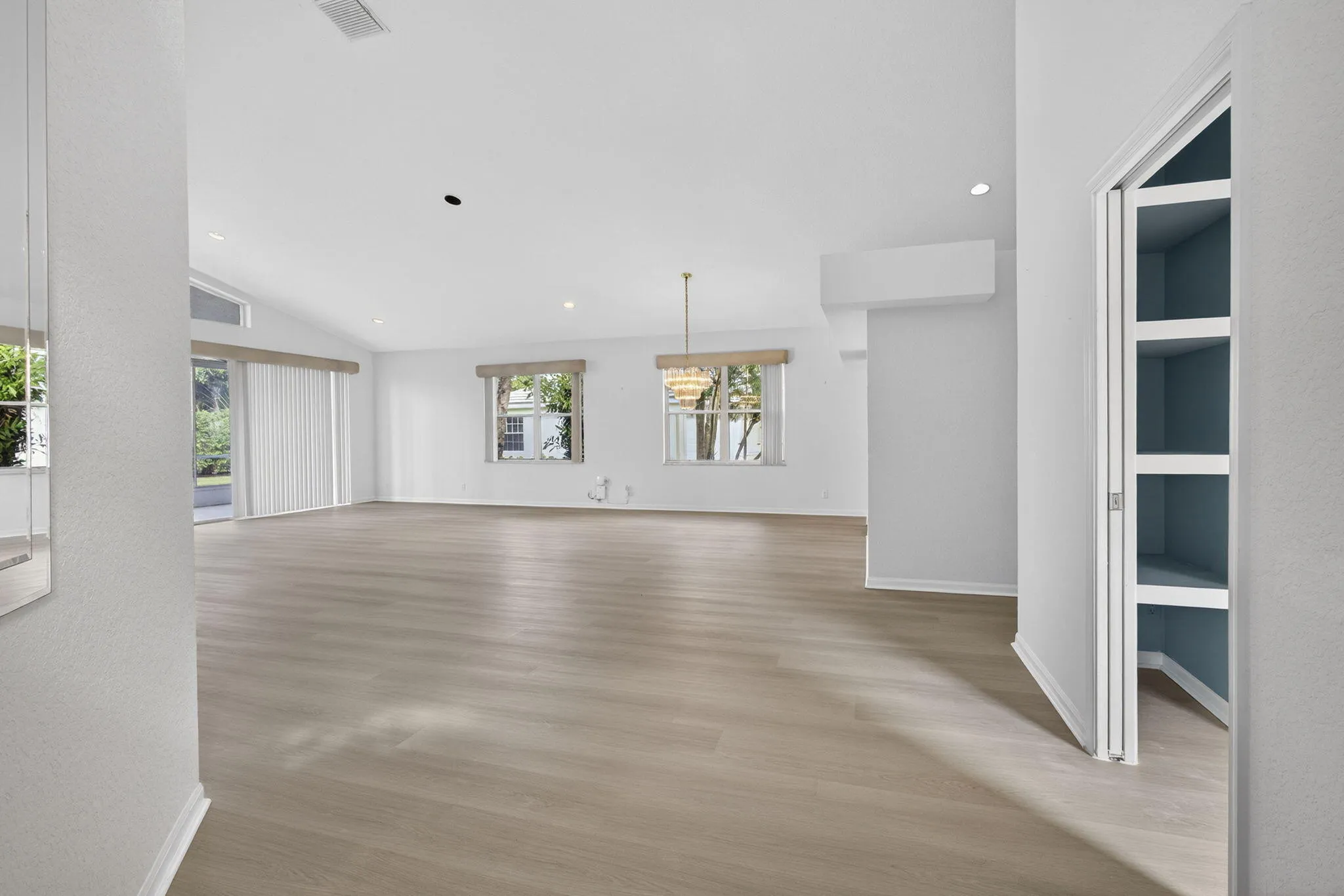 view front inside front door looking at huge living room and dinning area