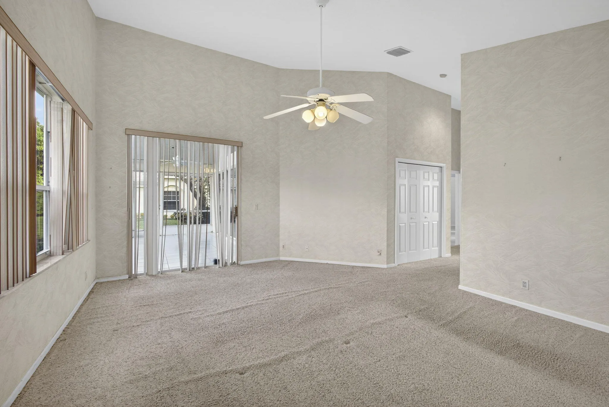 sliding door to Florida room and second closet