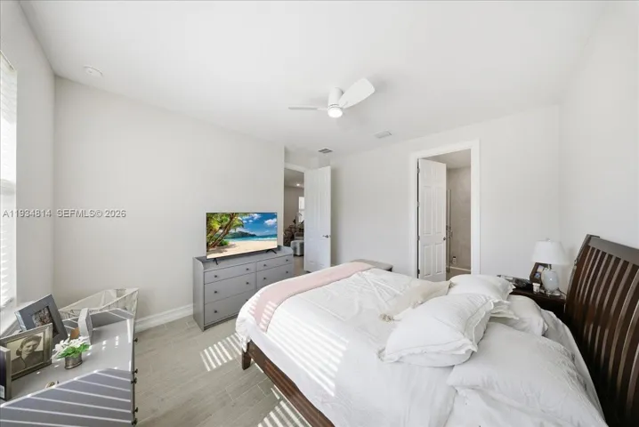 with light wood-style tile flooring
