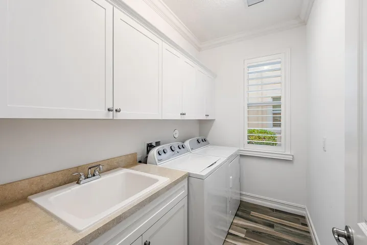 Laundry room with mop sink
