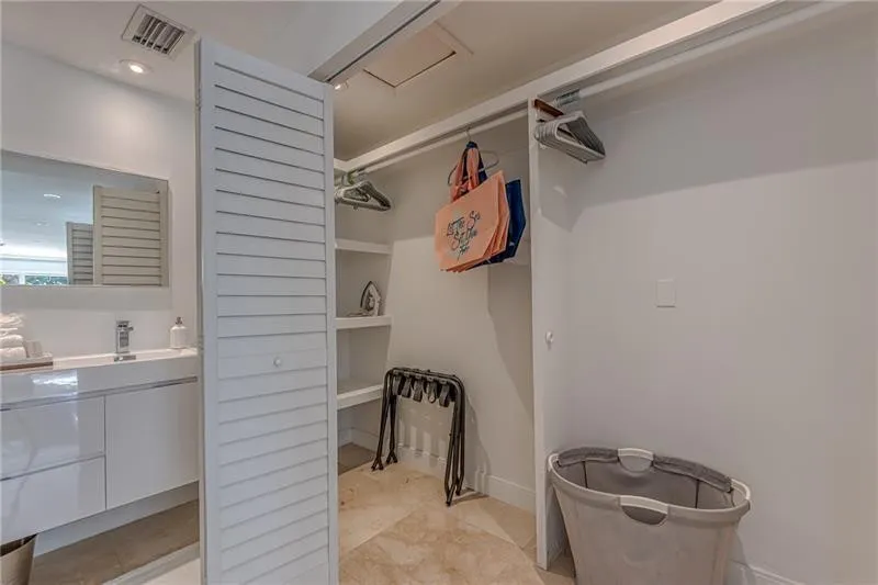 Spacey closet in primary bedroom