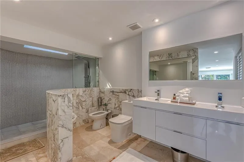 His and Hers primary Bathroom... Skylight in the shower!!