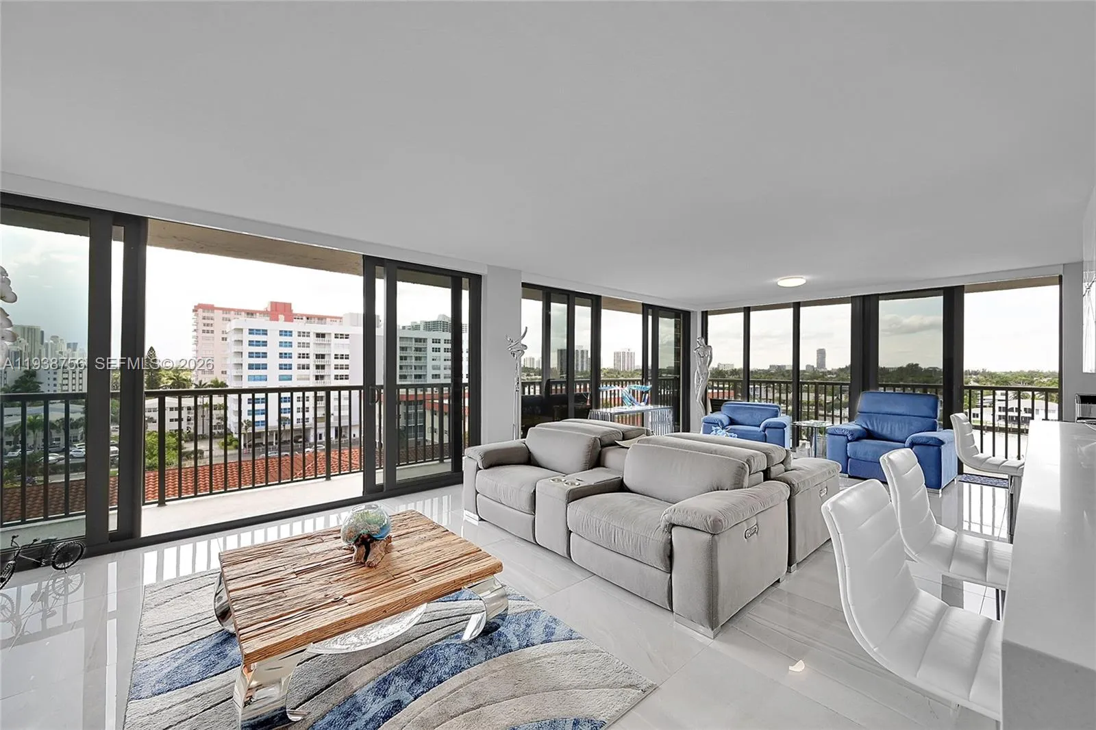 Open concept Living room with Double Sliding Hurricane Impact doors