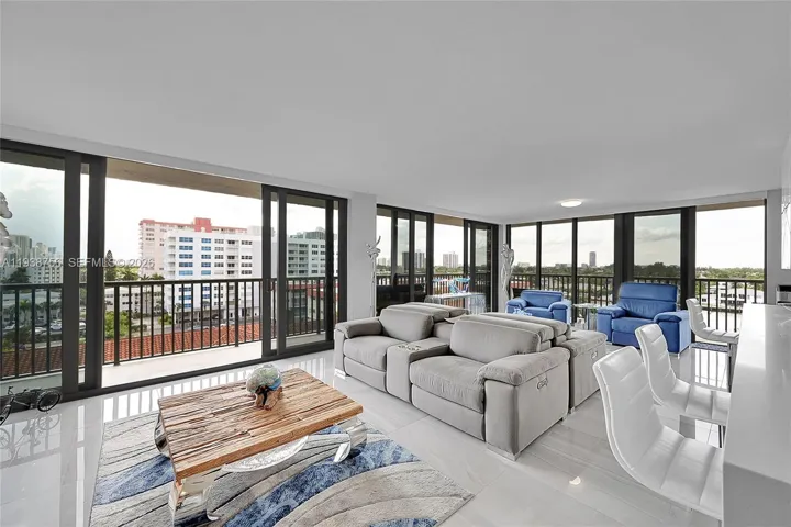 Open concept Living room with Double Sliding Hurricane Impact doors
