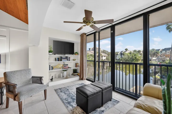 EXTENDED LIVING ROOM WITH POND VIEWS....