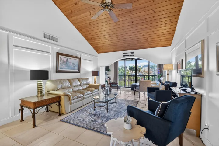 LIVING ROOM WITH VAULTED CEILING