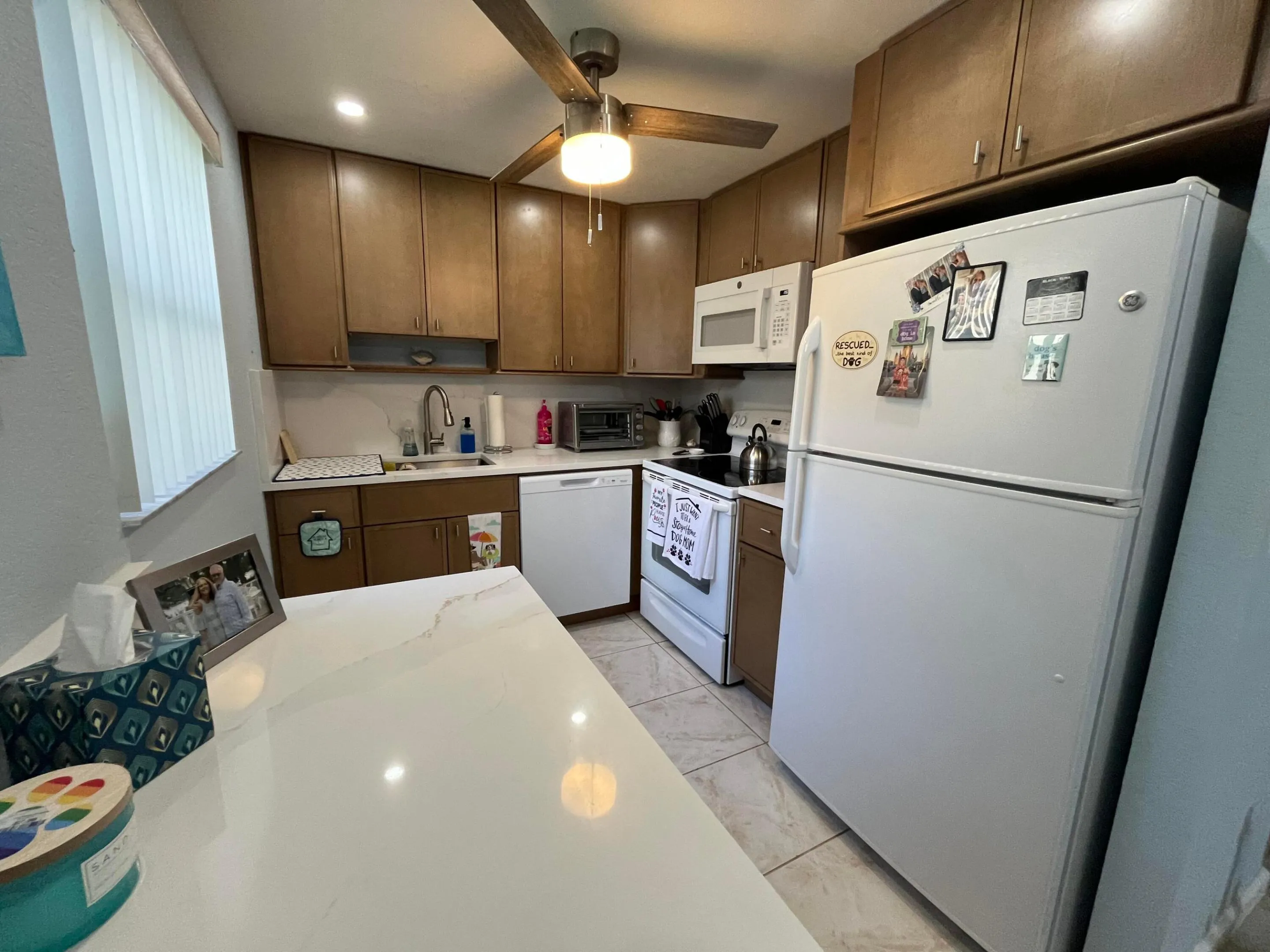 updated cabinetry/ white quartz countertops. All white appl.'s