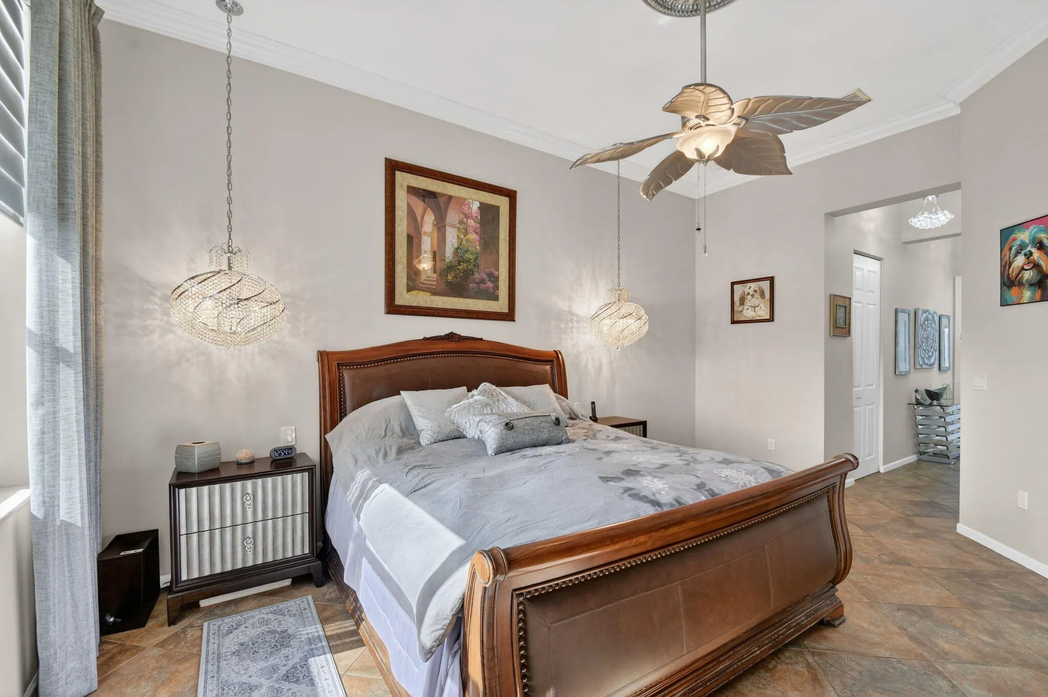 Beautiful lighting in Primary Room and there are Dual Closets with interior appointed by Closet Factory