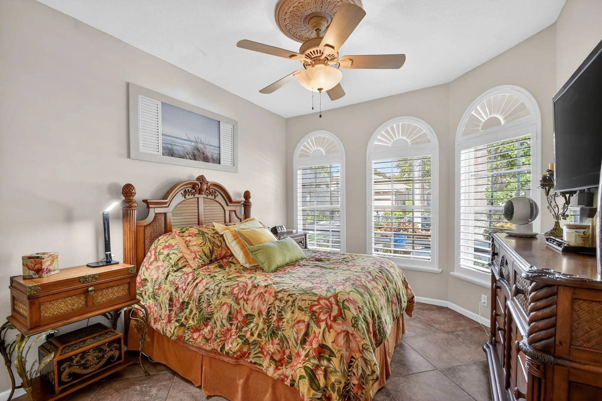 Guest Suite is window dressed with custom wood plantation shutters