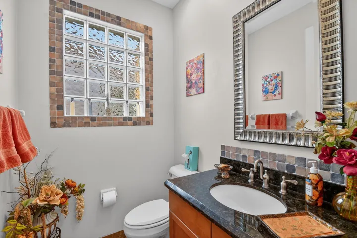 Note the tiled accents around the block glass window.