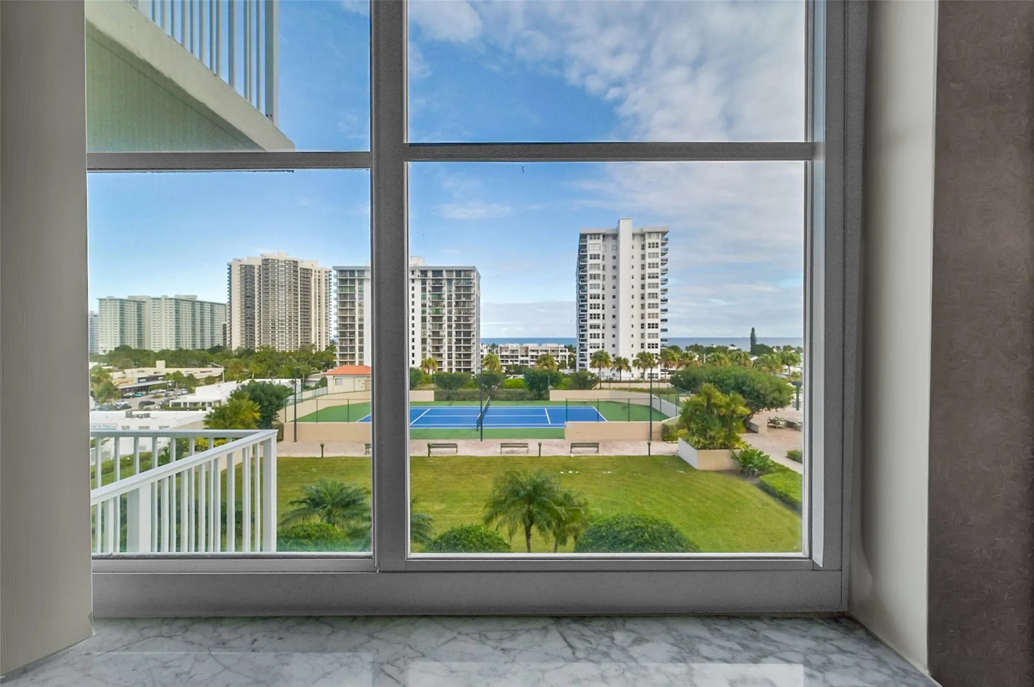 Yes you will even have a view of the ocean from your bedroom. The windows and sliders are impact.