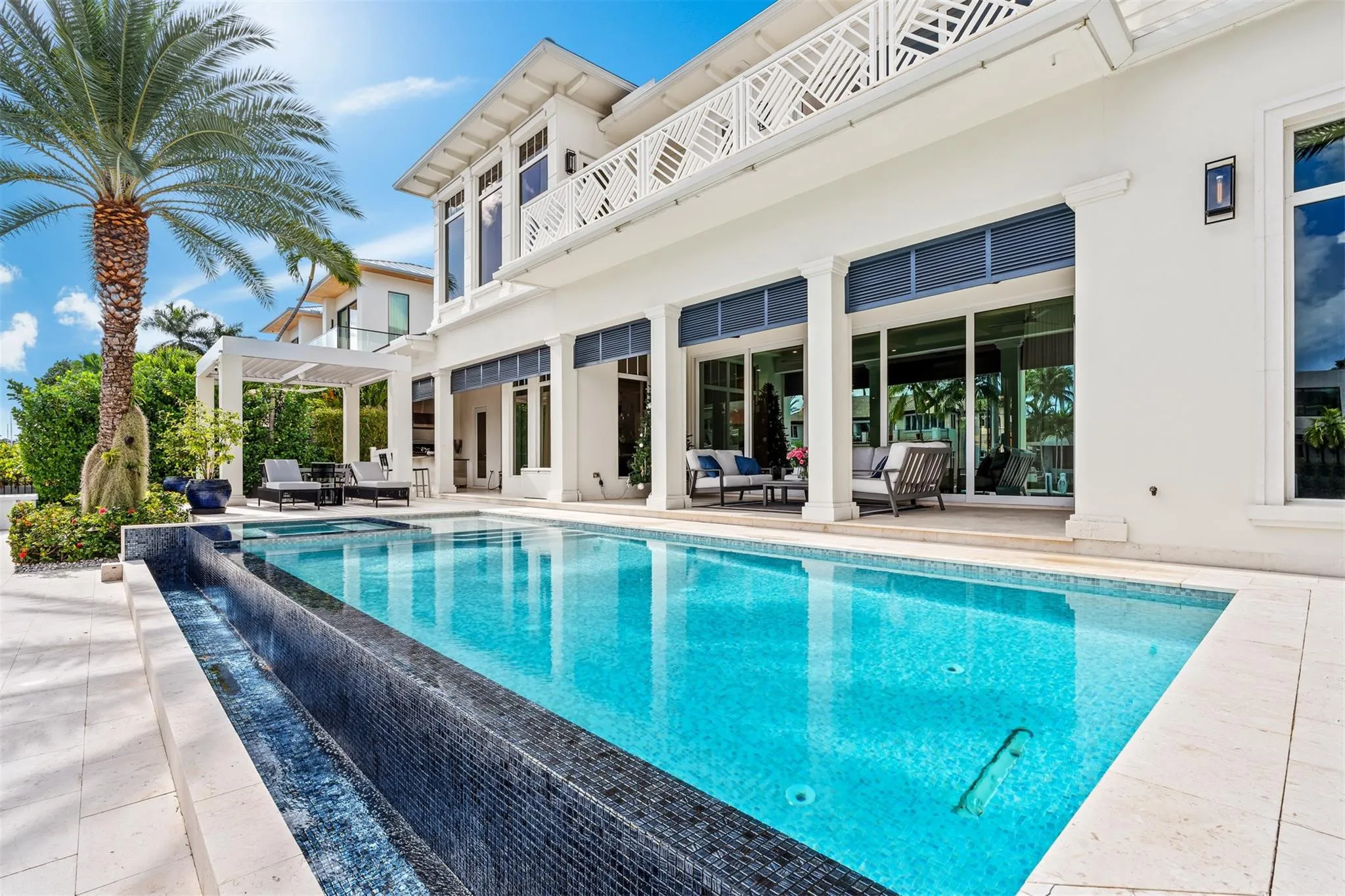 Enjoy waterfront views from your heated, saltwater pool.