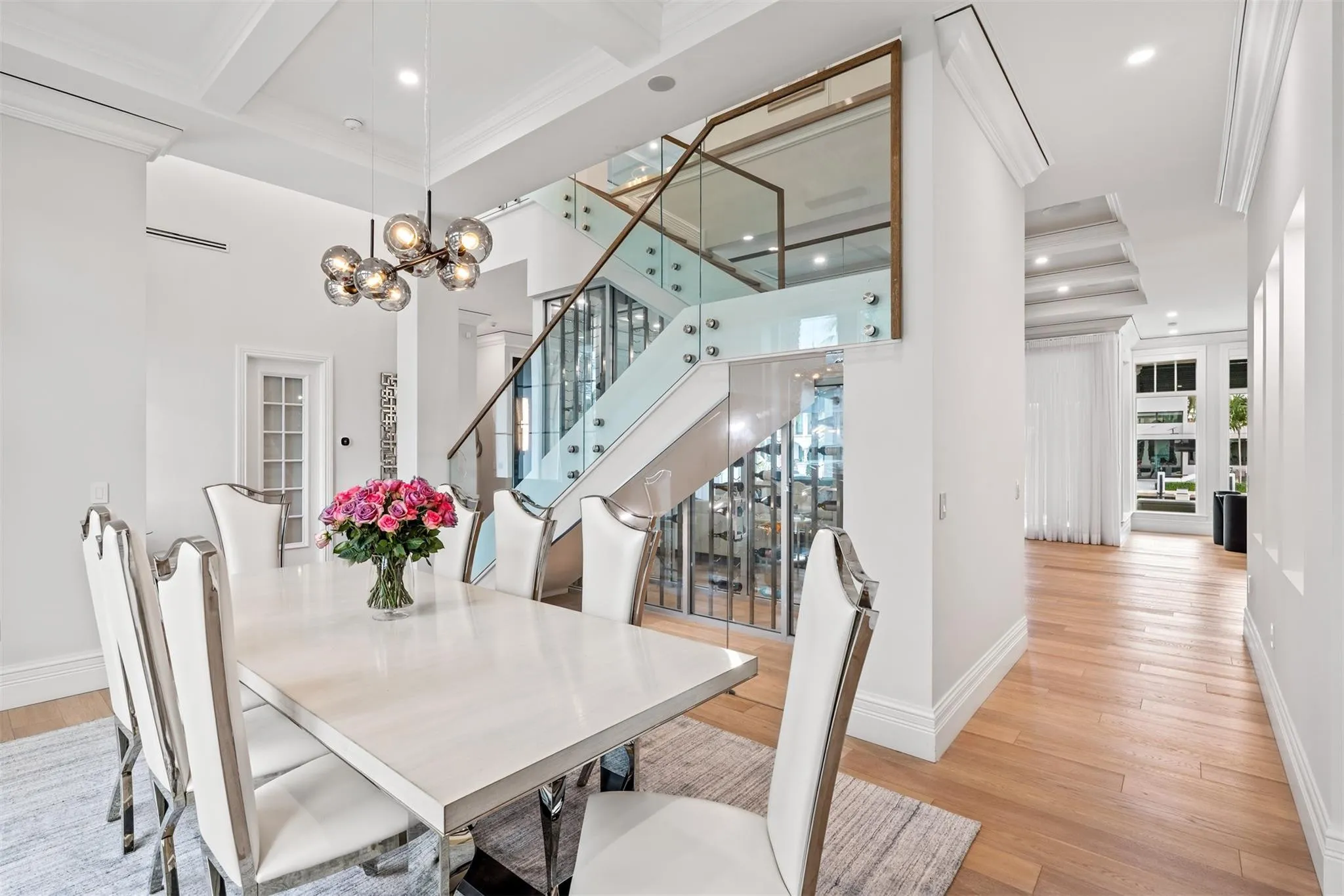 Large dinning room overlooking the wine cabinet.