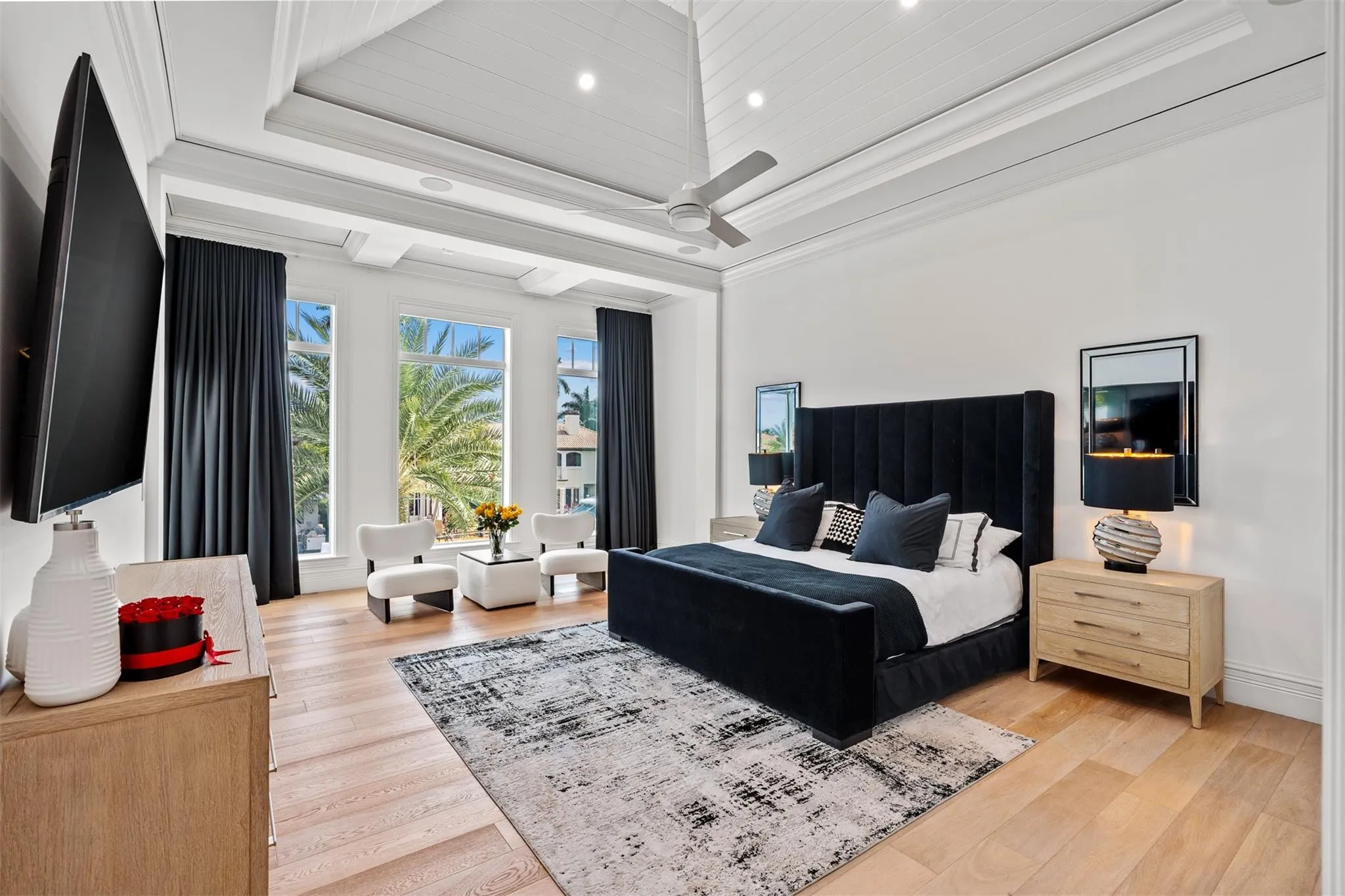 Primary suite with waterfront views and separate his and her bathrooms and closets.