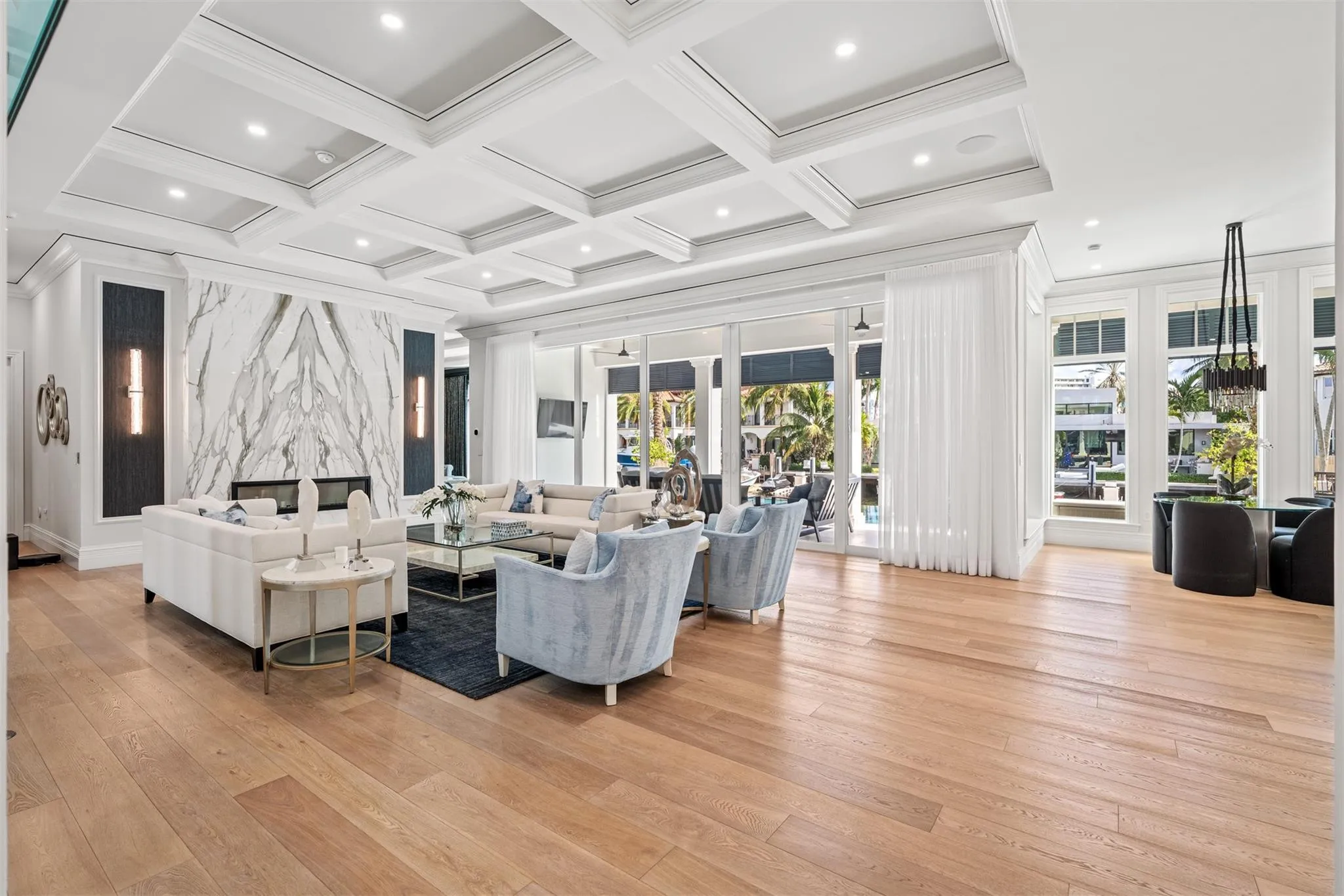 Main living room, great for relaxing nights by your gas, indoor fire place overlooking the water or for nights entertaining guests.