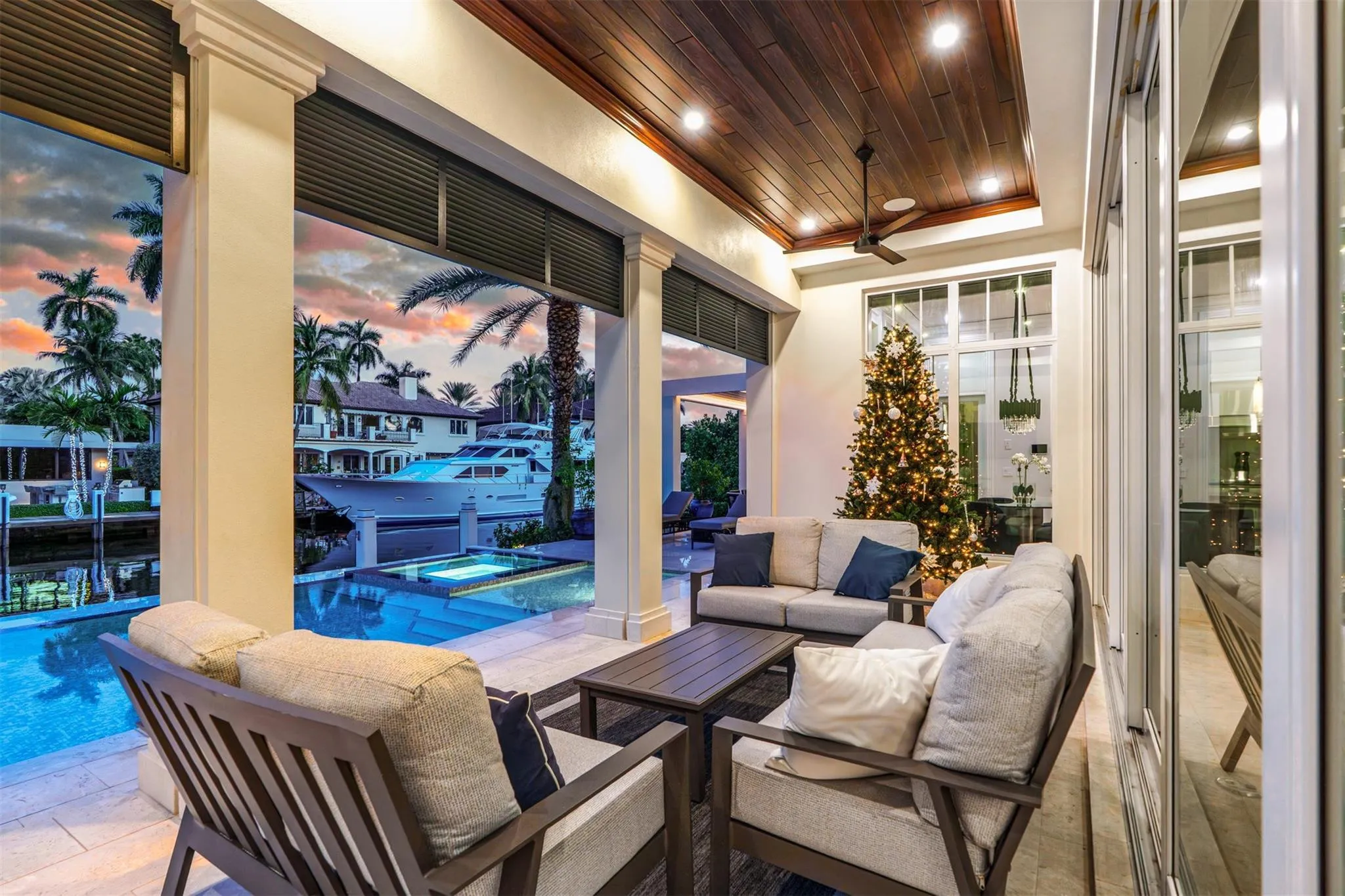 Enjoy sunsets from your covered, outdoor space. Perfect for days by the pool or relaxing and enjoying the waterfront views in the shade after a day of boating.