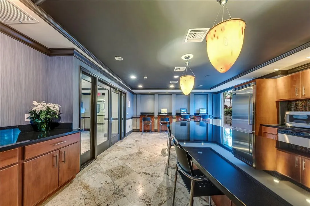 Co-working space and kitchen perfect for entertaining, whether you're hosting a party or enjoying family time by the pool.