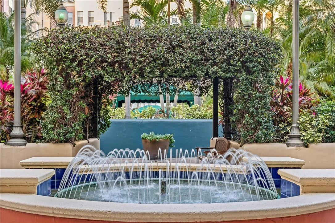 Gorgeous community spaces with seating, lush landscaping, water features & grills