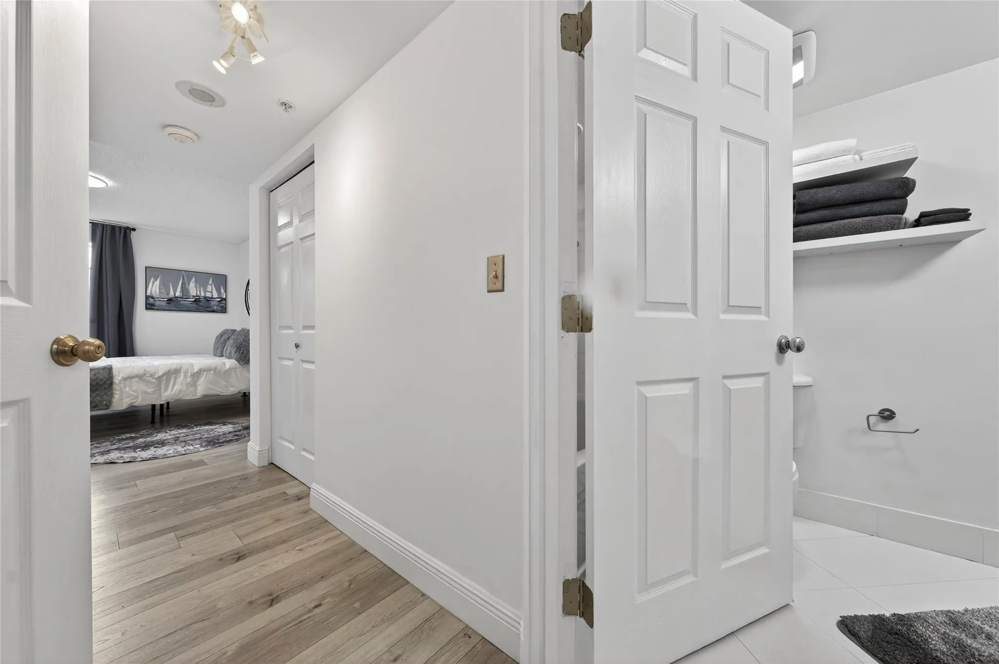 Split-bedroom layout features private hallways to each suite, creating enhanced separation and privacy from the main living areas.