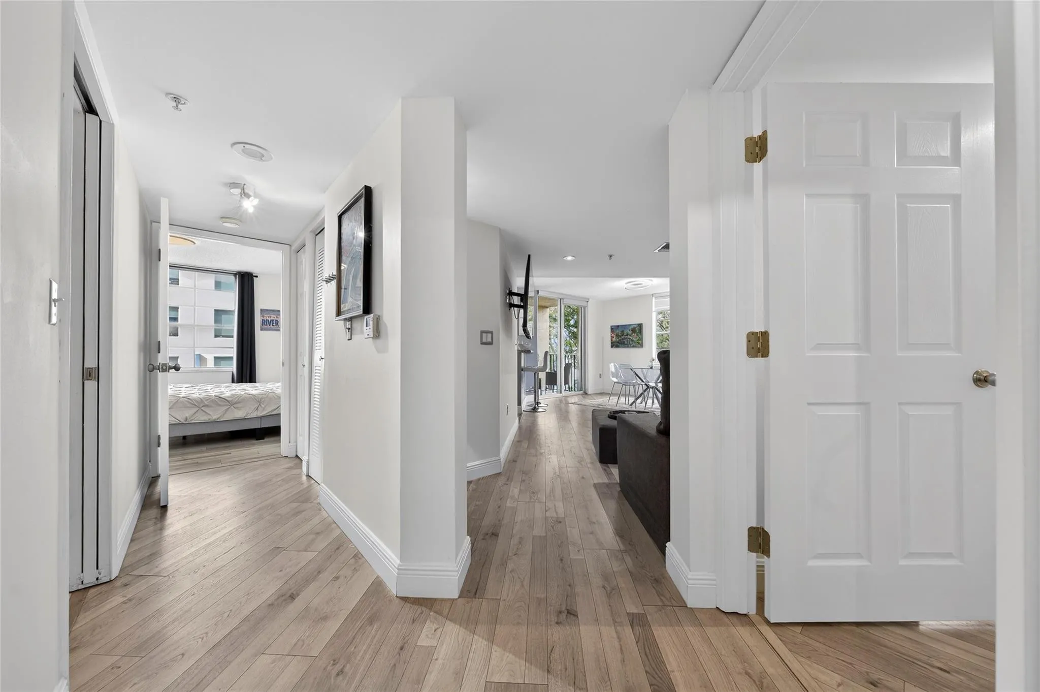 Split-bedroom layout features private hallways to each suite, creating enhanced separation and privacy from the main living areas.