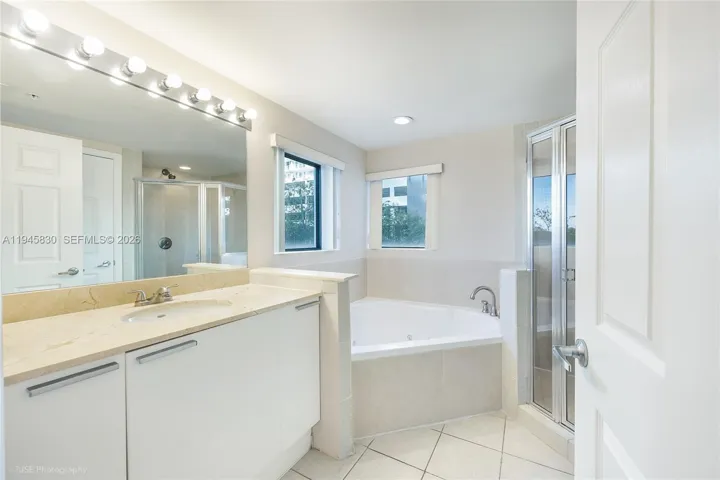 Master bathroom with windows and plenty of light