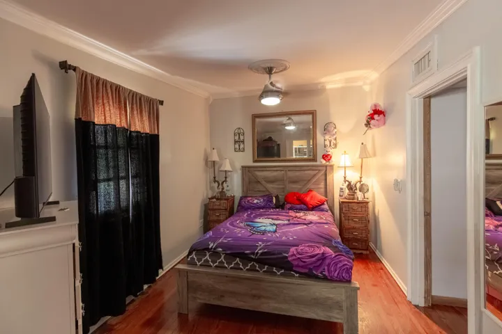 master bedroom with custom Armoirs