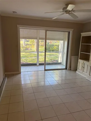 LIVING ROOM TO SCREENED PATIO