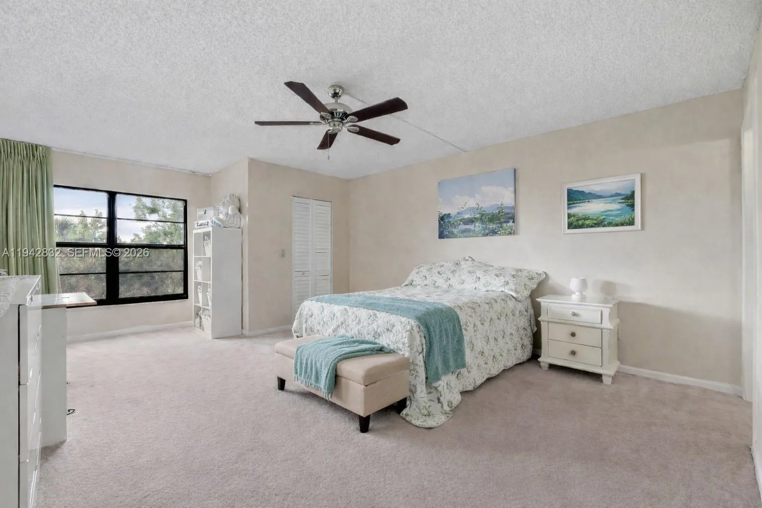 Large Primary Bedroom can accommodate a king size bed and 2 night stands and has 2 large walk in closets