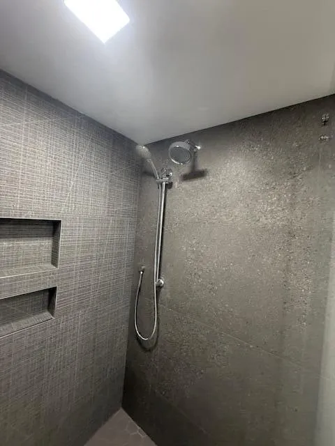tiled shower with dual shower heads