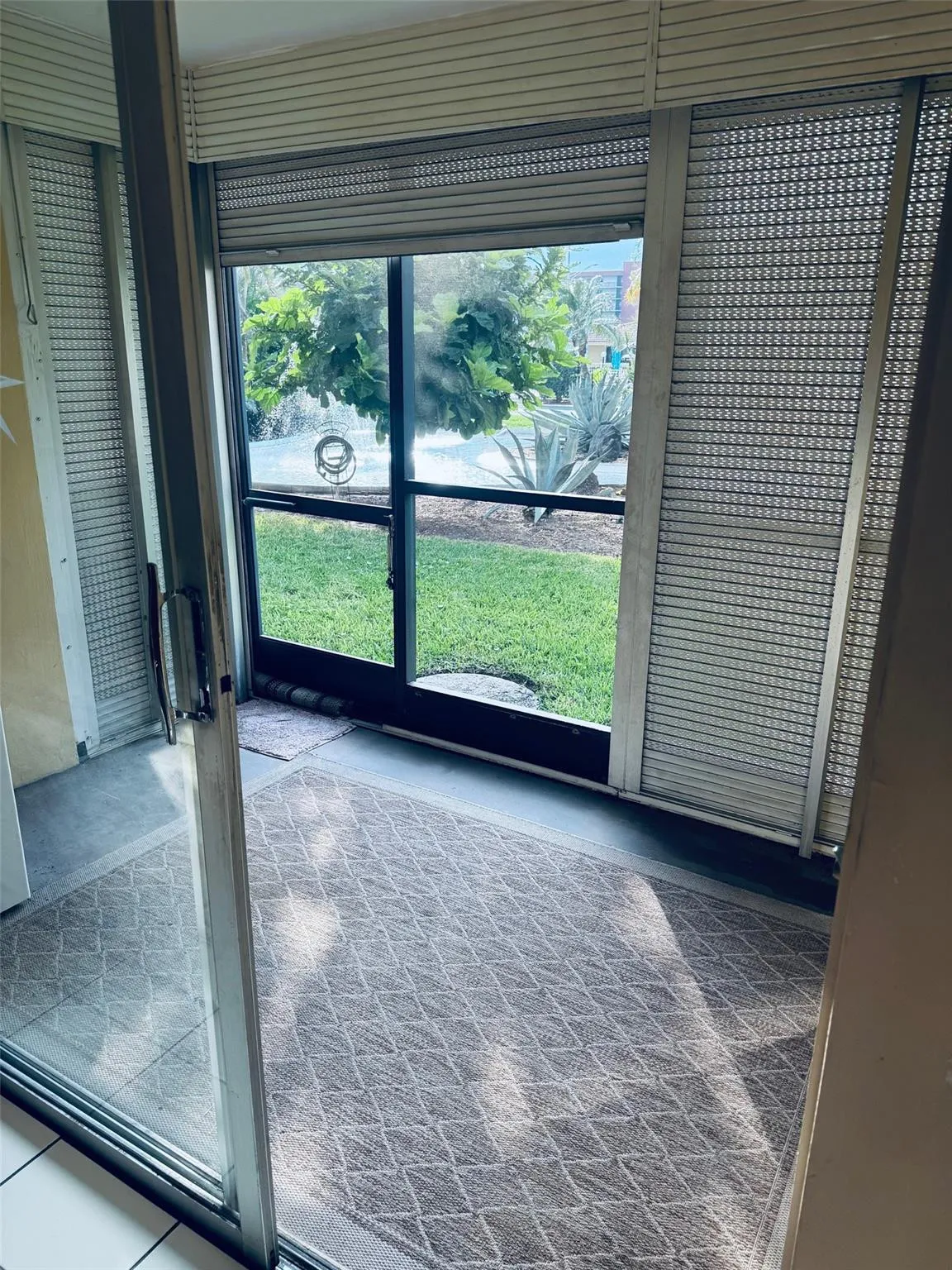 Large screened patio just steps to the pool!