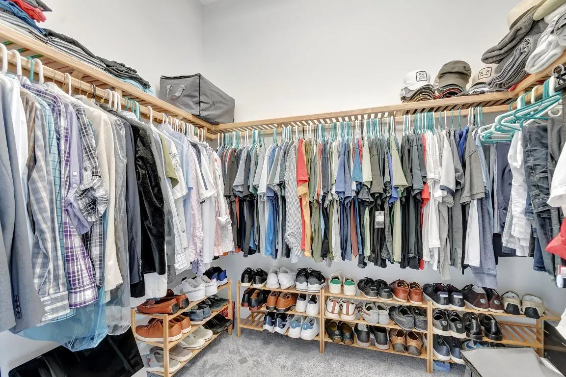 One of 2 Walk in Master Closets