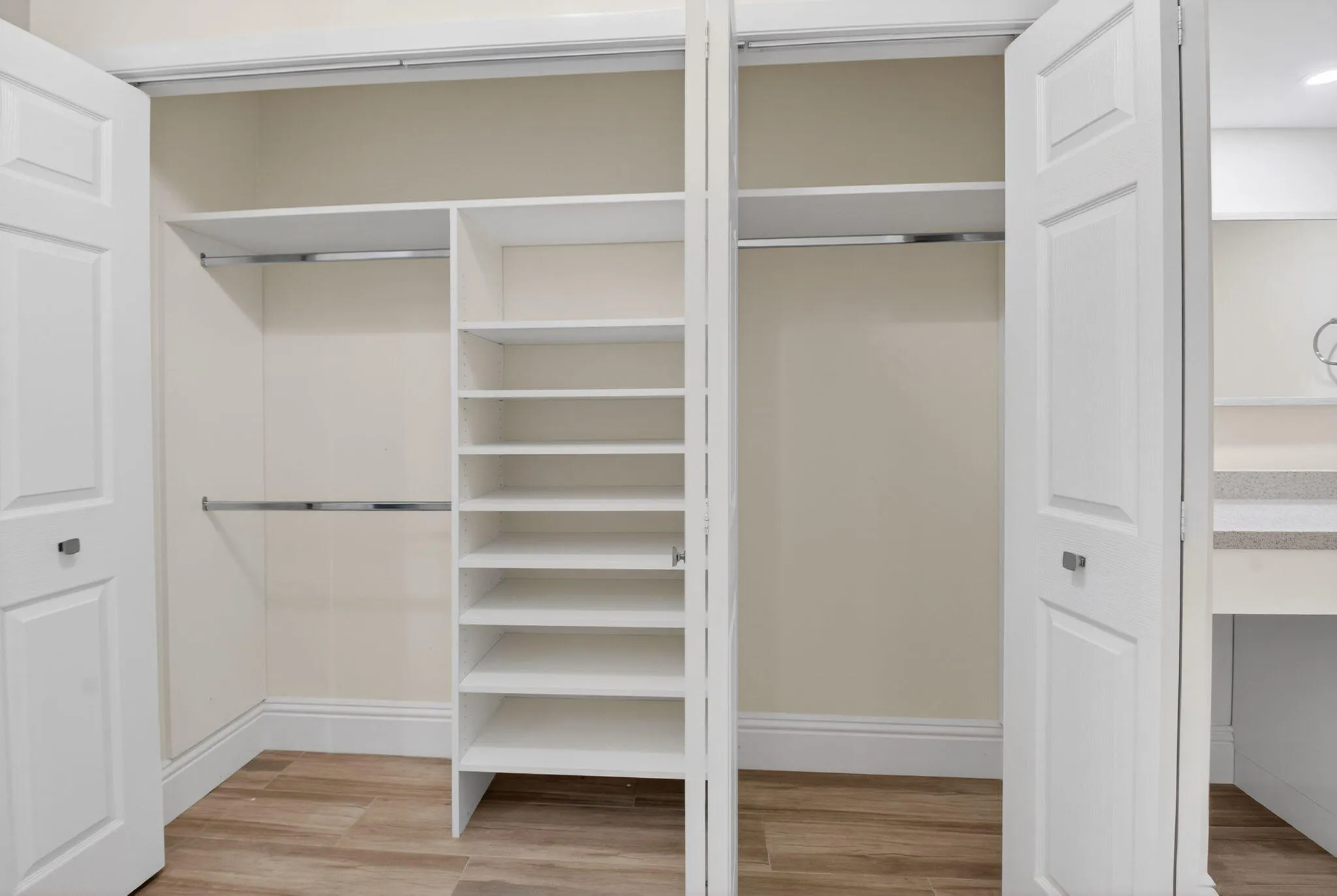 ONE OF TWO FITTED CLOSETS