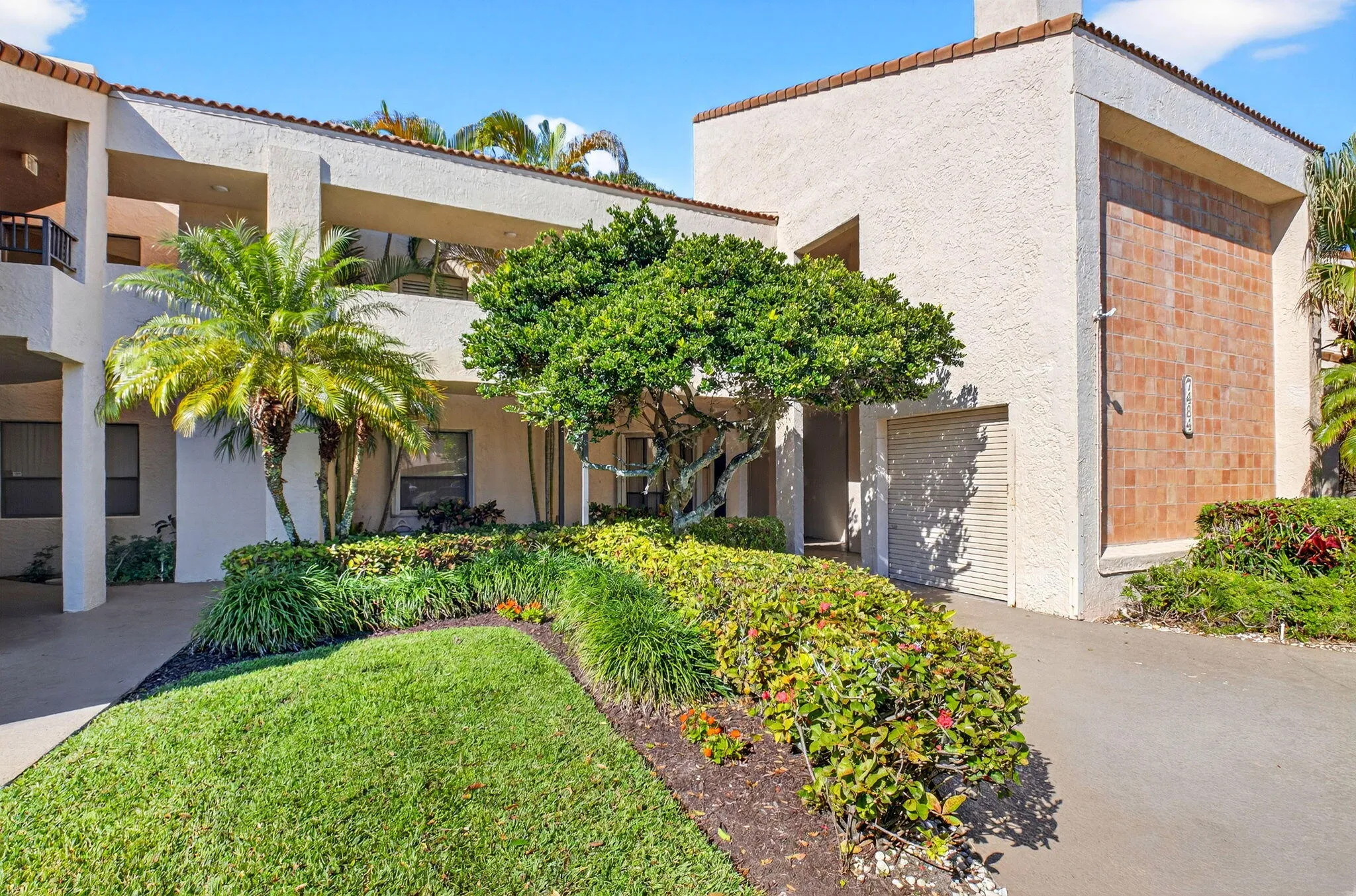 LUSHLY LANDSCAPED ENTRY