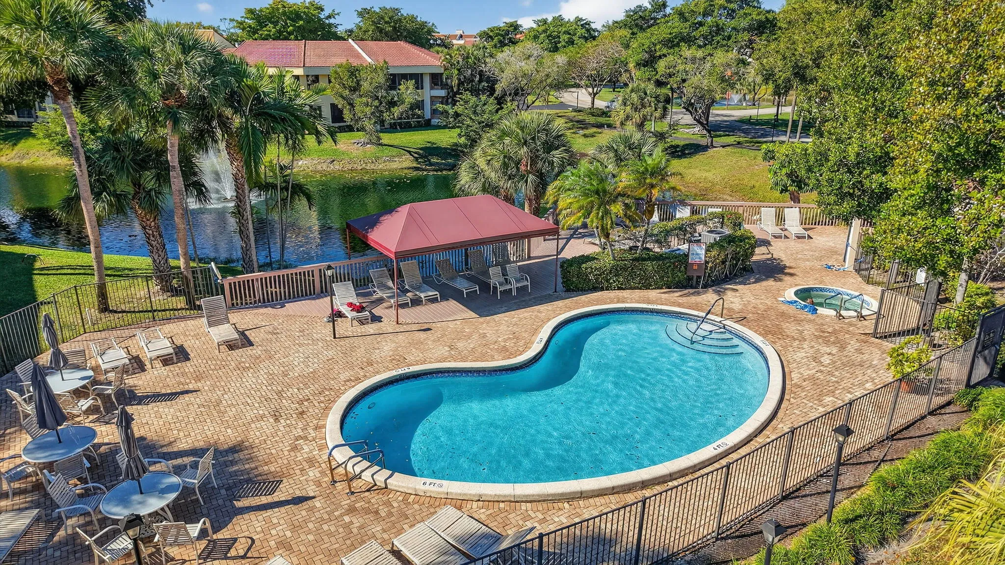 NEXT TO ONE OF TWO HEATED POOLS