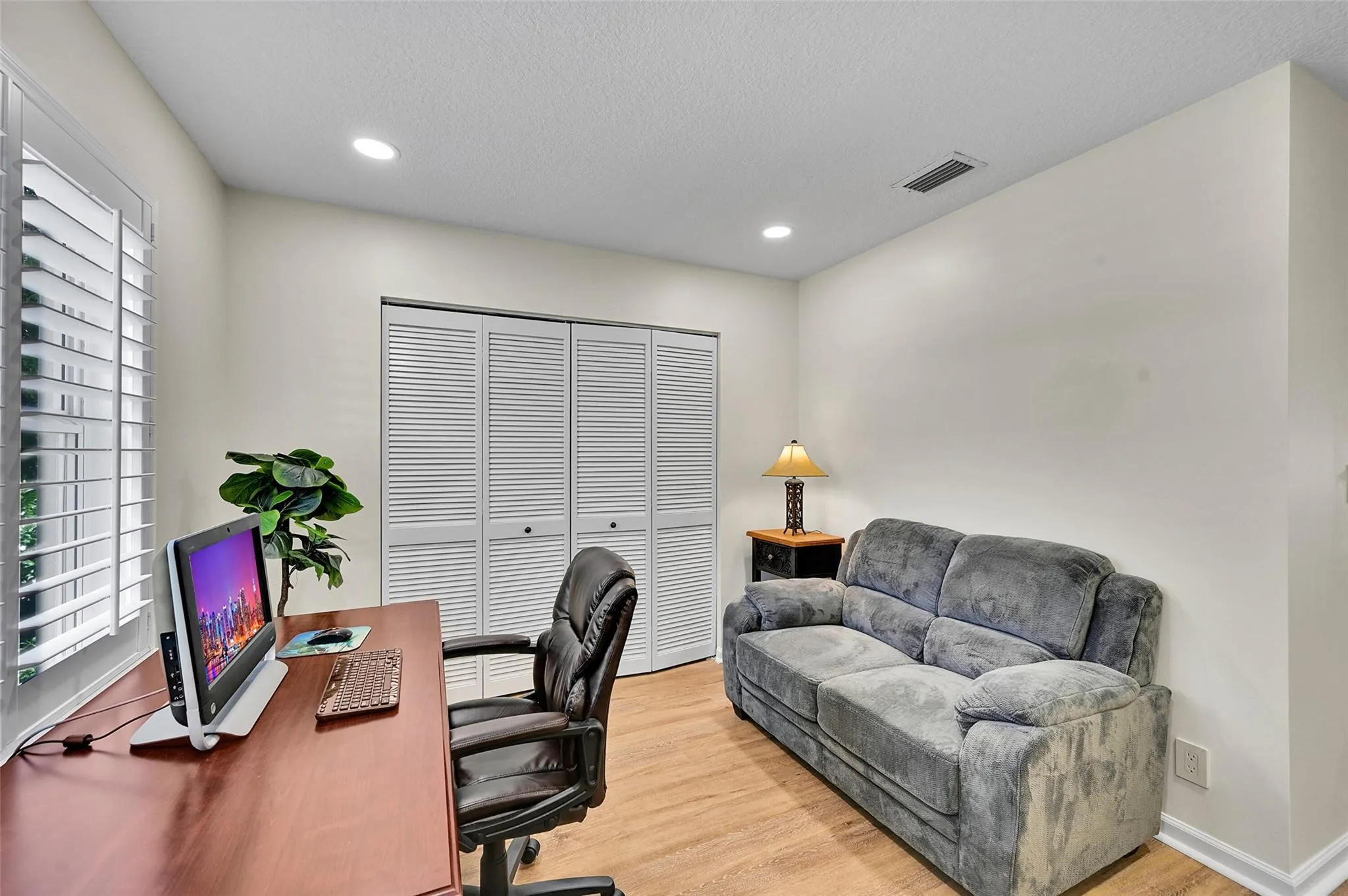 Front bedroom purposed as den/office