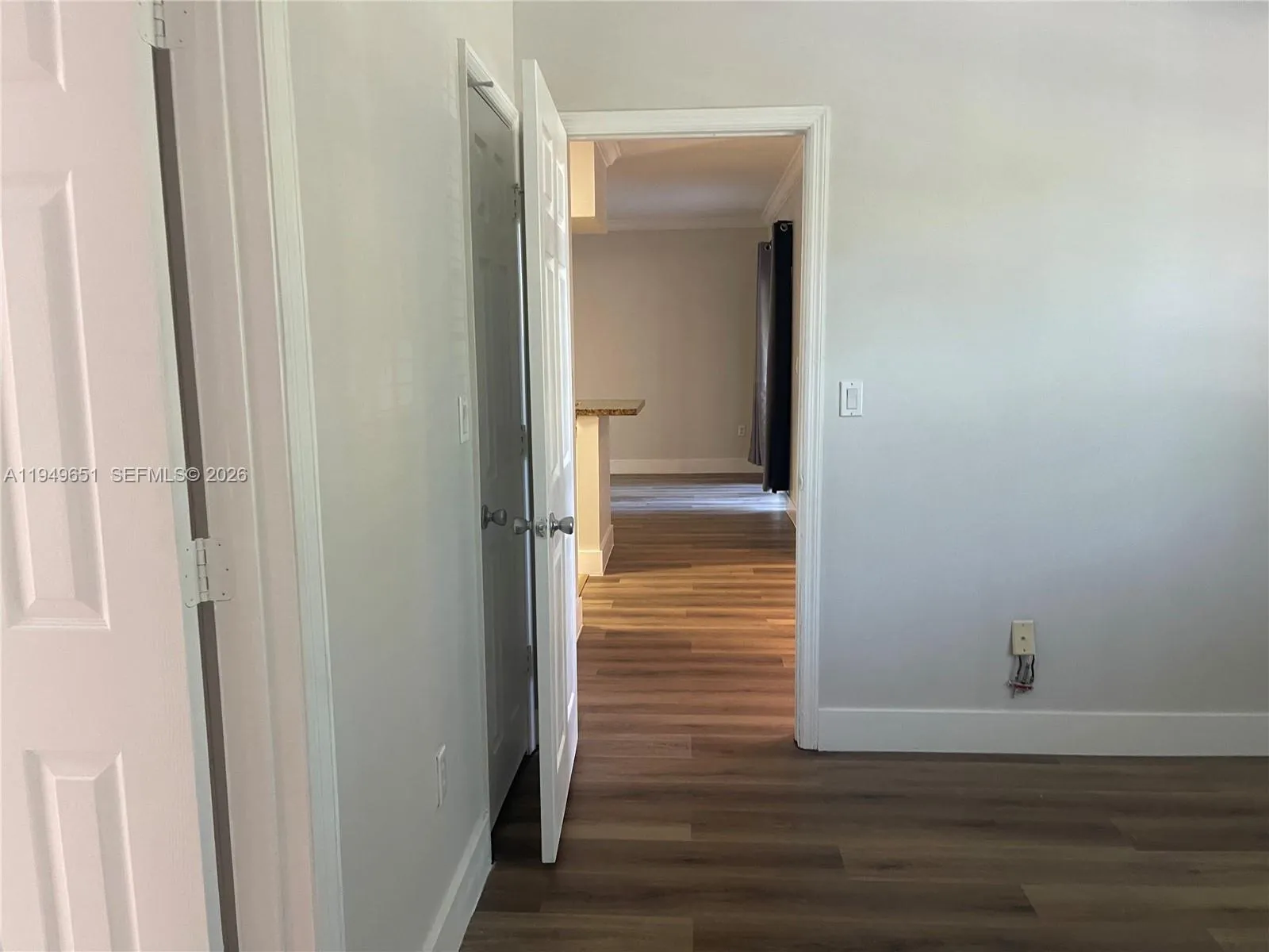 Primary bedroom view to living room