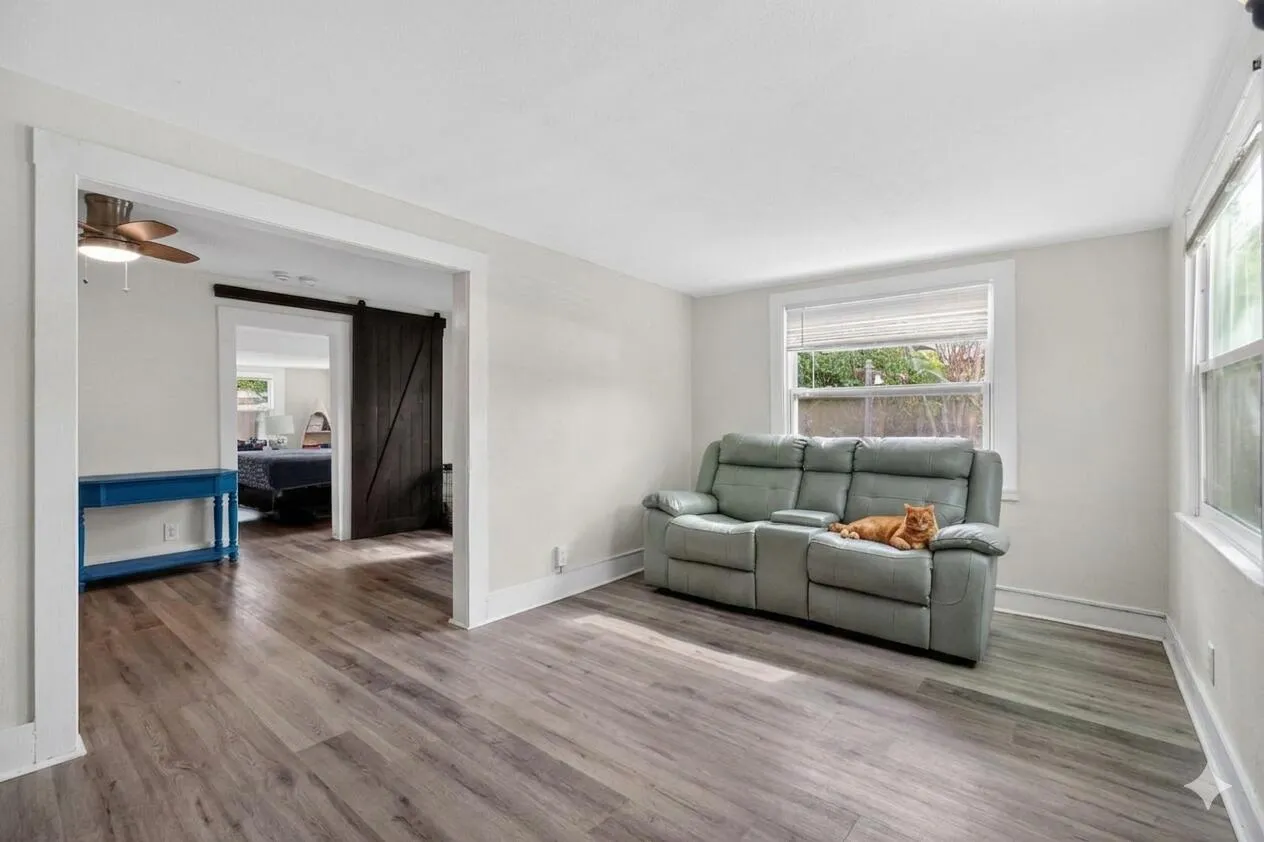As you walk in the front door, you have the main living room which heads into the second living space which can be used as dining room.