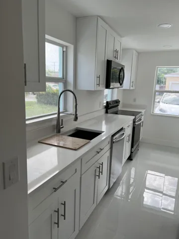 ROOM FOR DINING below 2 WINDOWS at end of KITCHEN!