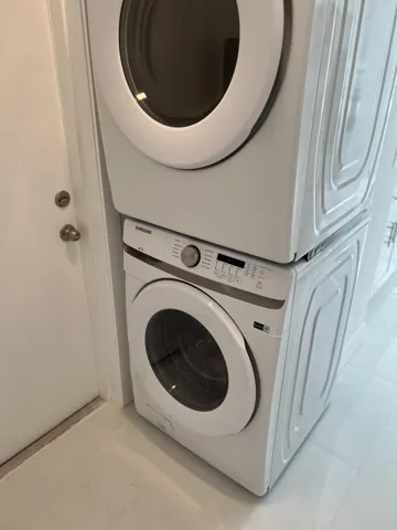 FULL SIZED WASHER and DRYER in its own LAUNDRY ROOM with STORAGE CLOSET.