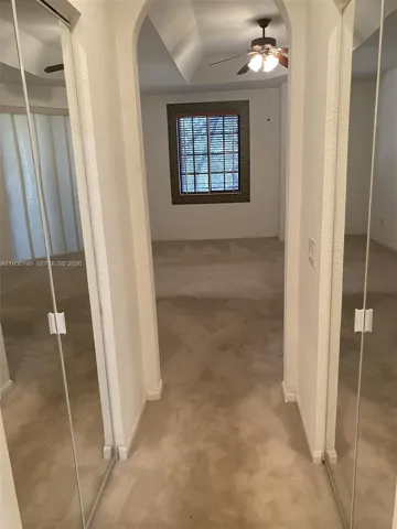 to m/b bath thru walking closets His & Her